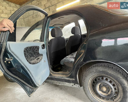 Зеленый Дэу Ланос, объемом двигателя 1.5 л и пробегом 104 тыс. км за 1850 $, фото 4 на Automoto.ua