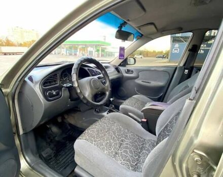 Зелений Деу Ланос, об'ємом двигуна 1.5 л та пробігом 257 тис. км за 2400 $, фото 2 на Automoto.ua