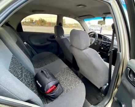 Зелений Деу Ланос, об'ємом двигуна 1.5 л та пробігом 257 тис. км за 2400 $, фото 11 на Automoto.ua