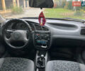 Деу Ланос 2004 у Ужгороді на Automoto.ua Зелений Деу Ланос, об'ємом двигуна 1.5 л та пробігом 124 тис. км за 2650 $, фото 20 на Automoto.ua
