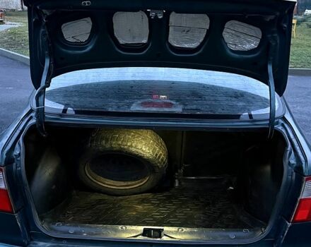 Зеленый Дэу Ланос, объемом двигателя 1.5 л и пробегом 330 тыс. км за 1550 $, фото 7 на Automoto.ua