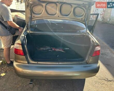 Зеленый Дэу Ланос, объемом двигателя 1.6 л и пробегом 350 тыс. км за 3000 $, фото 3 на Automoto.ua