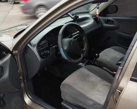 Зеленый Дэу Ланос, объемом двигателя 1.5 л и пробегом 239 тыс. км за 2500 $, фото 2 на Automoto.ua