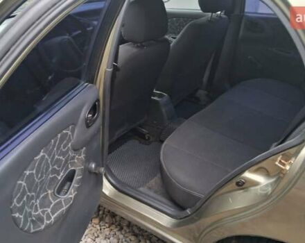 Зеленый Дэу Ланос, объемом двигателя 1.5 л и пробегом 190 тыс. км за 2450 $, фото 7 на Automoto.ua