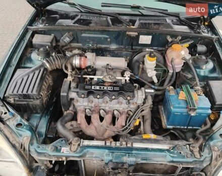 Дэу Ланос 2004 в Полтаве на Automoto.ua Зеленый Дэу Ланос, объемом двигателя 1.5 л и пробегом 200 тыс. км за 1850 $, фото 5 на Automoto.ua