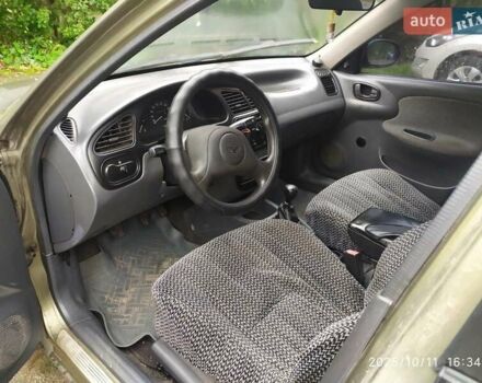 Деу Ланос 2004 у Умани на Automoto.ua Зелений Деу Ланос, об'ємом двигуна 1.5 л та пробігом 300 тис. км за 2300 $, фото 4 на Automoto.ua