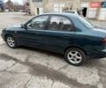 Зеленый Дэу Ланос, объемом двигателя 1.5 л и пробегом 250 тыс. км за 2900 $, фото 1 на Automoto.ua