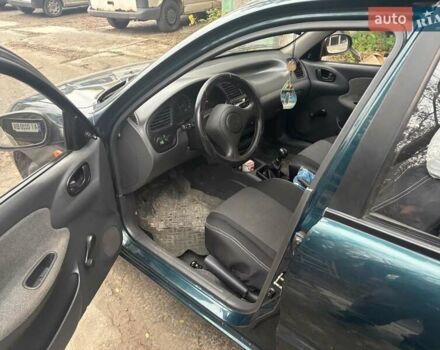 Зеленый Дэу Ланос, объемом двигателя 1.5 л и пробегом 154 тыс. км за 3600 $, фото 2 на Automoto.ua