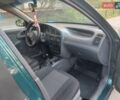 Дэу Ланос 2004 в Киеве на Automoto.ua Зеленый Дэу Ланос, объемом двигателя 1.5 л и пробегом 256 тыс. км за 2600 $, фото 7 на Automoto.ua