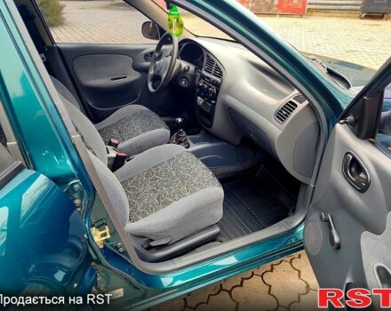 Зеленый Дэу Ланос, объемом двигателя 1.5 л и пробегом 185 тыс. км за 2750 $, фото 6 на Automoto.ua