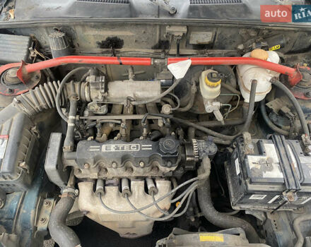 Зеленый Дэу Ланос, объемом двигателя 1.5 л и пробегом 183 тыс. км за 2000 $, фото 11 на Automoto.ua