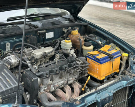 Зелений Деу Ланос, об'ємом двигуна 1.5 л та пробігом 241 тис. км за 2250 $, фото 51 на Automoto.ua