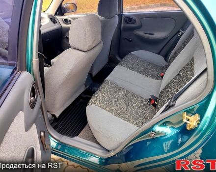 Зеленый Дэу Ланос, объемом двигателя 1.5 л и пробегом 185 тыс. км за 2750 $, фото 5 на Automoto.ua