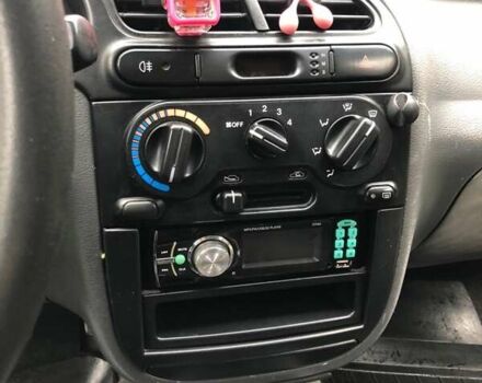 Зеленый Дэу Ланос, объемом двигателя 1.5 л и пробегом 208 тыс. км за 1900 $, фото 12 на Automoto.ua