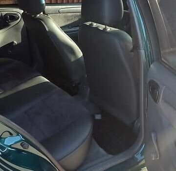 Зелений Деу Ланос, об'ємом двигуна 1.5 л та пробігом 300 тис. км за 4200 $, фото 12 на Automoto.ua