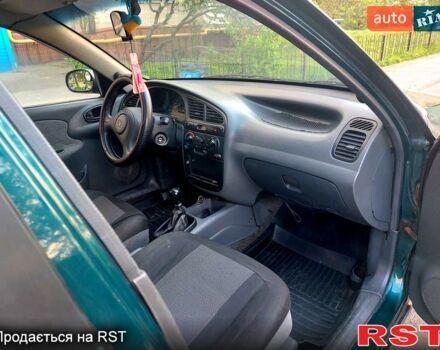 Зелений Деу Ланос, об'ємом двигуна 1.5 л та пробігом 257 тис. км за 2400 $, фото 4 на Automoto.ua