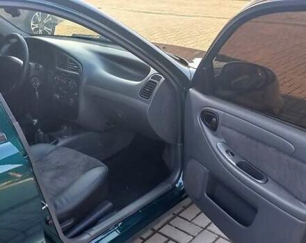 Зелений Деу Ланос, об'ємом двигуна 1.5 л та пробігом 300 тис. км за 4200 $, фото 10 на Automoto.ua