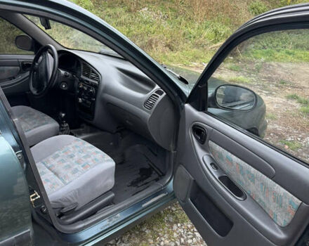 Зелений Деу Ланос, об'ємом двигуна 1.5 л та пробігом 250 тис. км за 2100 $, фото 8 на Automoto.ua