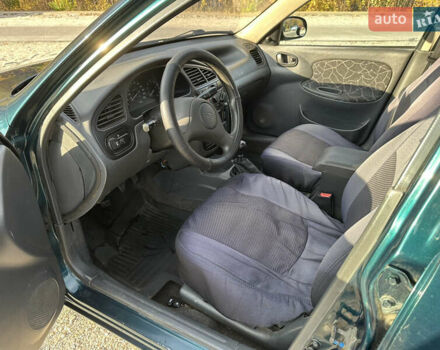 Зелений Деу Ланос, об'ємом двигуна 1.5 л та пробігом 324 тис. км за 2800 $, фото 7 на Automoto.ua