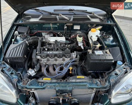 Зеленый Дэу Ланос, объемом двигателя 1.5 л и пробегом 285 тыс. км за 3000 $, фото 13 на Automoto.ua