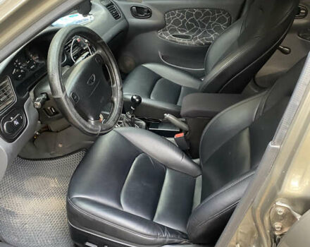 Зеленый Дэу Ланос, объемом двигателя 1.5 л и пробегом 245 тыс. км за 3499 $, фото 4 на Automoto.ua