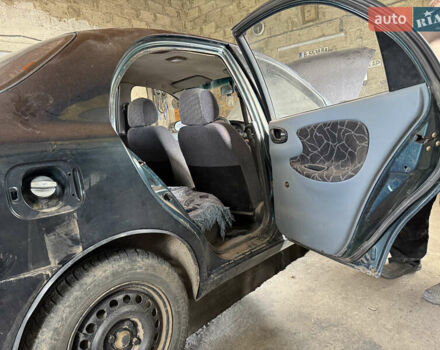 Зеленый Дэу Ланос, объемом двигателя 1.5 л и пробегом 104 тыс. км за 1850 $, фото 5 на Automoto.ua