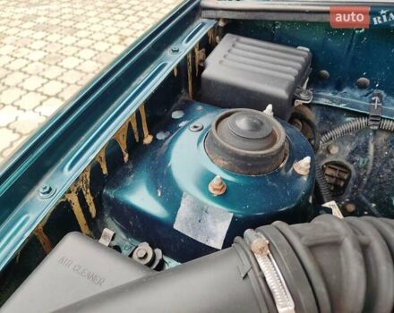 Зеленый Дэу Ланос, объемом двигателя 1.5 л и пробегом 185 тыс. км за 2750 $, фото 14 на Automoto.ua