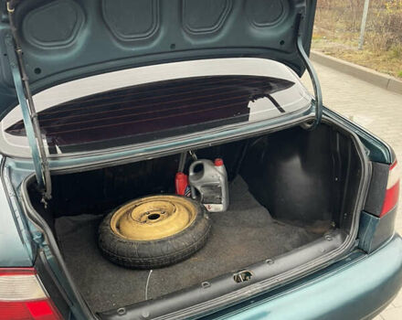 Зелений Деу Ланос, об'ємом двигуна 1.5 л та пробігом 200 тис. км за 1399 $, фото 7 на Automoto.ua