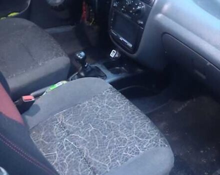 Зеленый Дэу Ланос, объемом двигателя 1.5 л и пробегом 283 тыс. км за 1950 $, фото 2 на Automoto.ua