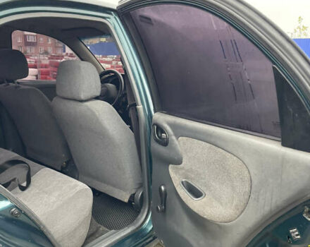 Зелений Деу Ланос, об'ємом двигуна 1.5 л та пробігом 200 тис. км за 1399 $, фото 8 на Automoto.ua