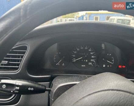 Зеленый Дэу Ланос, объемом двигателя 1.5 л и пробегом 154 тыс. км за 3600 $, фото 3 на Automoto.ua