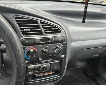 Деу Ланос 2004 у Кривому Розі на Automoto.ua Зелений Деу Ланос, об'ємом двигуна 1.5 л та пробігом 184 тис. км за 3100 $, фото 10 на Automoto.ua