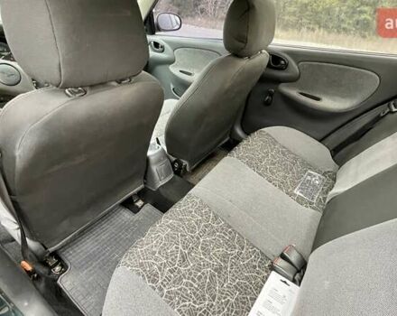 Зеленый Дэу Ланос, объемом двигателя 1.5 л и пробегом 220 тыс. км за 2800 $, фото 4 на Automoto.ua