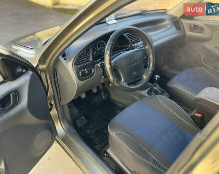 Зеленый Дэу Ланос, объемом двигателя 1.6 л и пробегом 221 тыс. км за 2500 $, фото 11 на Automoto.ua