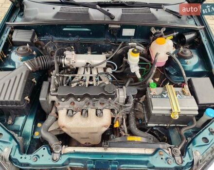 Зеленый Дэу Ланос, объемом двигателя 1.5 л и пробегом 185 тыс. км за 2750 $, фото 12 на Automoto.ua