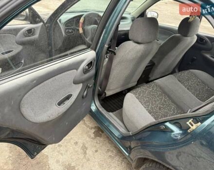 Зеленый Дэу Ланос, объемом двигателя 1.5 л и пробегом 250 тыс. км за 2900 $, фото 12 на Automoto.ua