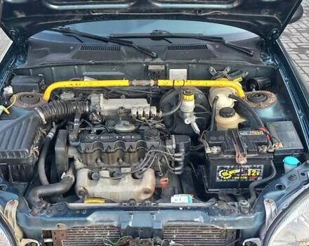 Зелений Деу Ланос, об'ємом двигуна 1.5 л та пробігом 300 тис. км за 4200 $, фото 7 на Automoto.ua