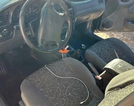 Зеленый Дэу Ланос, объемом двигателя 1.6 л и пробегом 350 тыс. км за 3000 $, фото 6 на Automoto.ua