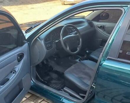 Зелений Деу Ланос, об'ємом двигуна 1.5 л та пробігом 300 тис. км за 4200 $, фото 9 на Automoto.ua