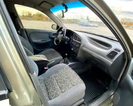 Зелений Деу Ланос, об'ємом двигуна 1.5 л та пробігом 257 тис. км за 2400 $, фото 8 на Automoto.ua