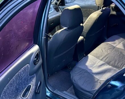 Зеленый Дэу Ланос, объемом двигателя 1.5 л и пробегом 330 тыс. км за 1550 $, фото 6 на Automoto.ua