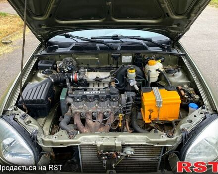 Зеленый Дэу Ланос, объемом двигателя 1.5 л и пробегом 197 тыс. км за 1950 $, фото 5 на Automoto.ua