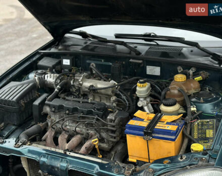 Зелений Деу Ланос, об'ємом двигуна 1.5 л та пробігом 241 тис. км за 2250 $, фото 49 на Automoto.ua