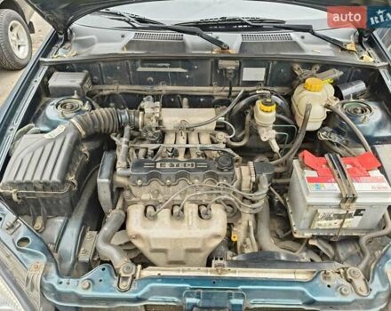 Деу Ланос 2004 у Кривому Розі на Automoto.ua Зелений Деу Ланос, об'ємом двигуна 1.5 л та пробігом 184 тис. км за 3100 $, фото 9 на Automoto.ua