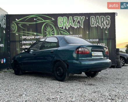 Зеленый Дэу Ланос, объемом двигателя 1.5 л и пробегом 387 тыс. км за 1400 $, фото 7 на Automoto.ua