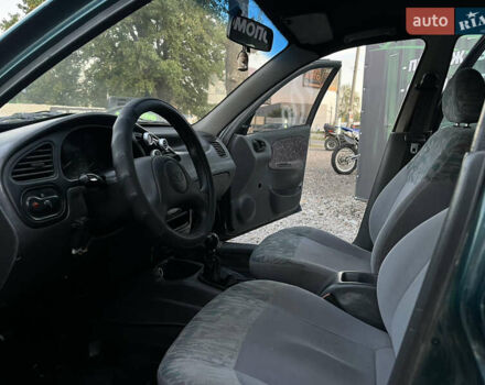 Зеленый Дэу Ланос, объемом двигателя 1.5 л и пробегом 387 тыс. км за 1400 $, фото 8 на Automoto.ua