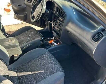 Зеленый Дэу Ланос, объемом двигателя 1.6 л и пробегом 350 тыс. км за 3000 $, фото 7 на Automoto.ua