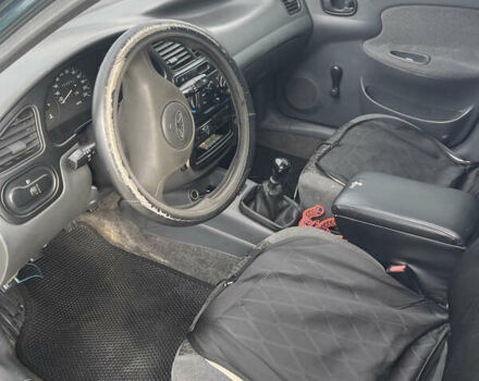 Зелений Деу Ланос, об'ємом двигуна 1.5 л та пробігом 354 тис. км за 1999 $, фото 7 на Automoto.ua