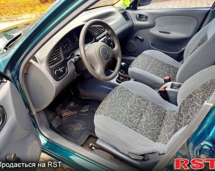 Зеленый Дэу Ланос, объемом двигателя 1.5 л и пробегом 185 тыс. км за 2750 $, фото 4 на Automoto.ua