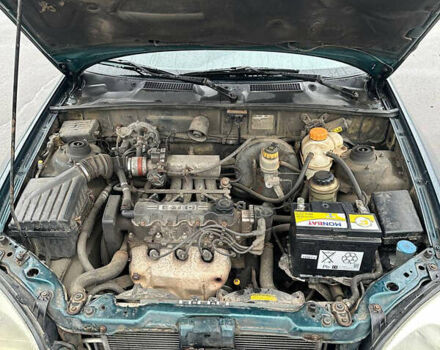 Зелений Деу Ланос, об'ємом двигуна 1.5 л та пробігом 256 тис. км за 1950 $, фото 6 на Automoto.ua